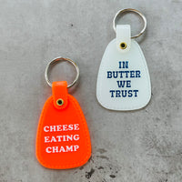 In butter we trust Saddle keychain