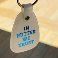 In butter we trust Saddle keychain