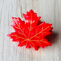 Maple leaf hair claw with metal teeth