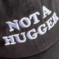 Not a hugger Dad Hat