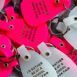 I’d Rather be at a School Book Fair Saddle Keychain