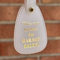 This car brakes for Garage Sales Saddle Keychain