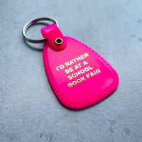 I’d Rather be at a School Book Fair Saddle Keychain