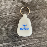 Not a Hugger Saddle Keychain