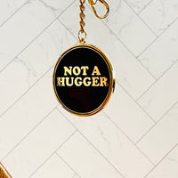 Not a Hugger Keychain // 2 options