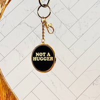 Not a Hugger Keychain // 2 options