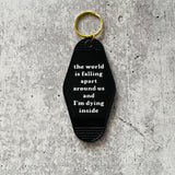 World is falling apart around us and I’m dying inside hotel Motel Keychain