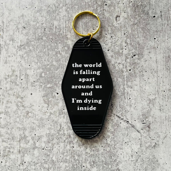 World is falling apart around us and I’m dying inside hotel Motel Keychain