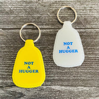 Not a Hugger Saddle Keychain