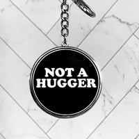 Not a Hugger Keychain // 2 options