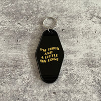 Tired and a little on edge  hotel Motel Keychain