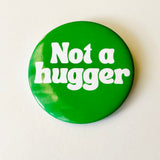 Not a hugger Pinback Button 2.25”