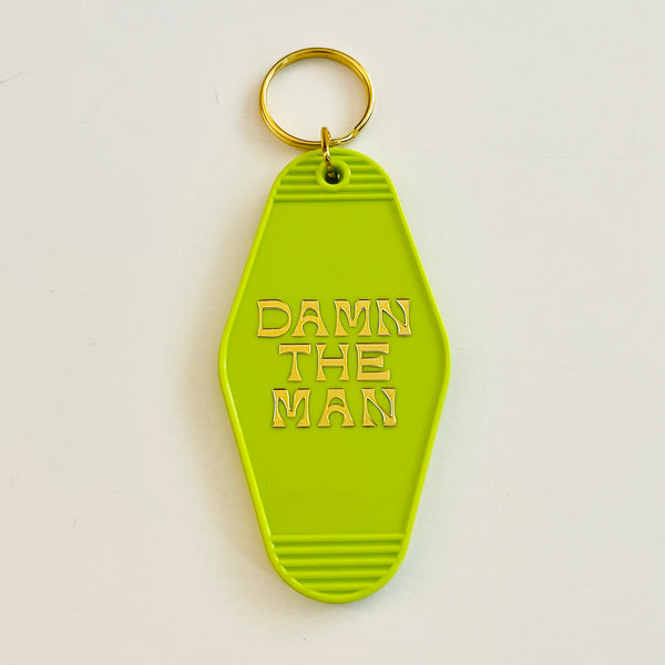 Damn the man hotel Motel Keychain