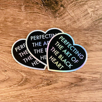 Perfecting the art of the black heart Holographic sticker 3”