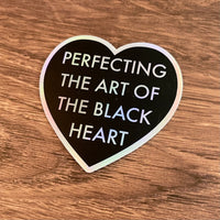 Perfecting the art of the black heart Holographic sticker 3”