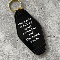 World is falling apart around us and I’m dying inside hotel Motel Keychain