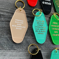 Tossed salads and scrambled eggs hotel Motel Keychain